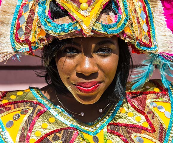 Smiling Bahamas lady in traditional colourful costume