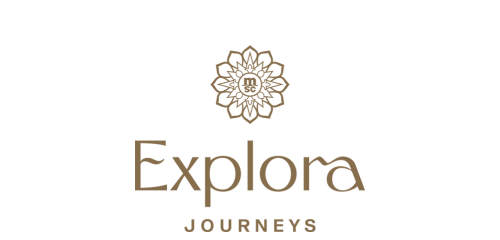 Logo of Explora Journeys featuring a stylized lotus flower and elegant typography in gold tones.