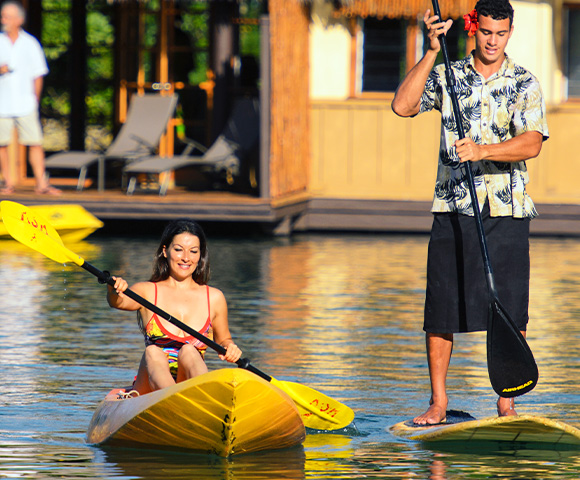 two-people-kayaking-and-stand-up-paddle-boarding-at-koro-sun-resort-fiji