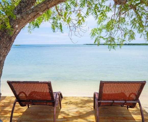 my-fiji-view-of-the-beach-with-chairs-at-landers-bay-resort-spa-fiji