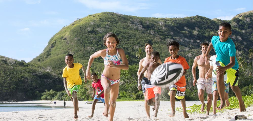 my-fiji-kids-playing-beach-rugby-in-in-mamanuca-islands