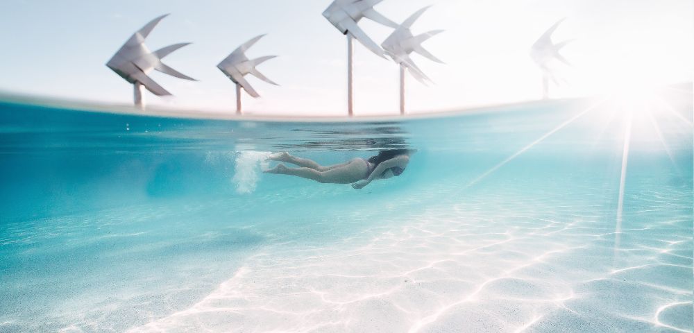 MY-HOLIDAY-Woman-swimming-in-cairns-lagoon