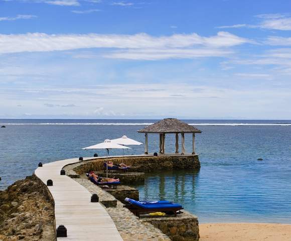 MYHOLIDAY-THE-WARWICK-FIJI-BOARDWALK-WITH-GAZEBO-AT-END-IN-OCEAN