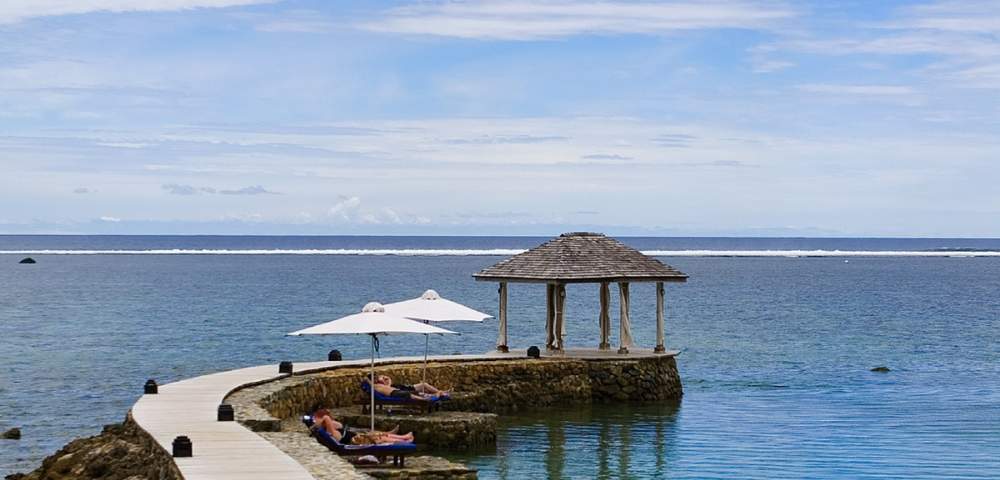 MYHOLIDAY-THE-WARWICK-FIJI-BOARDWALK-WITH-GAZEBO-AT-END-IN-OCEAN