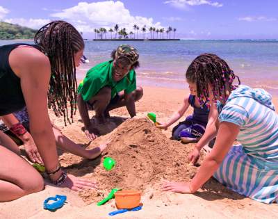 MYHOLIDAY-THE-NAVITI-RESORT-KIDS-PLAYING-IN-THE-SAND-ON-THE-BEACH