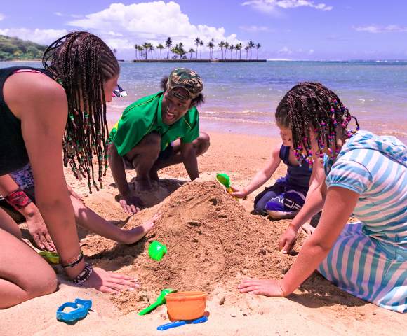 MYHOLIDAY-THE-NAVITI-RESORT-KIDS-PLAYING-IN-THE-SAND-ON-THE-BEACH