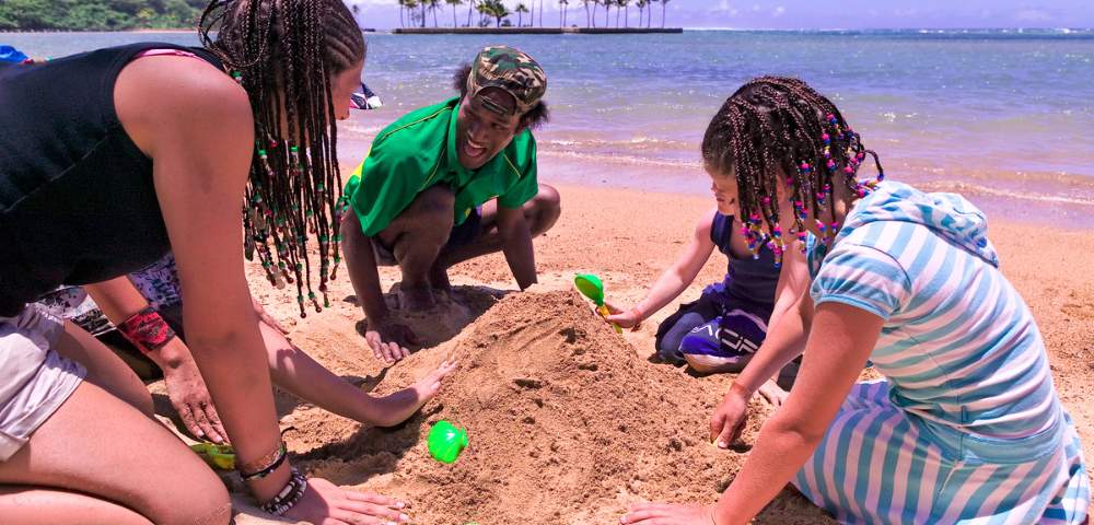 MYHOLIDAY-THE-NAVITI-RESORT-KIDS-PLAYING-IN-THE-SAND-ON-THE-BEACH