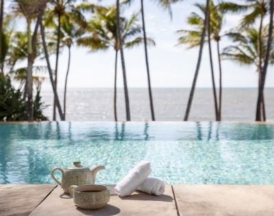 MYQUEENSLAND-alamanda-palm-cove-by-lancemore-RESORTS-OUTSIDE-POOL-WITH-LOUNGE-CHAIRS