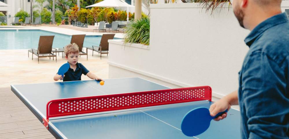 MYQUEENSLAND-MERCURE-GOLD-COAST-RESORT-father-and-son-playing-ping-pong