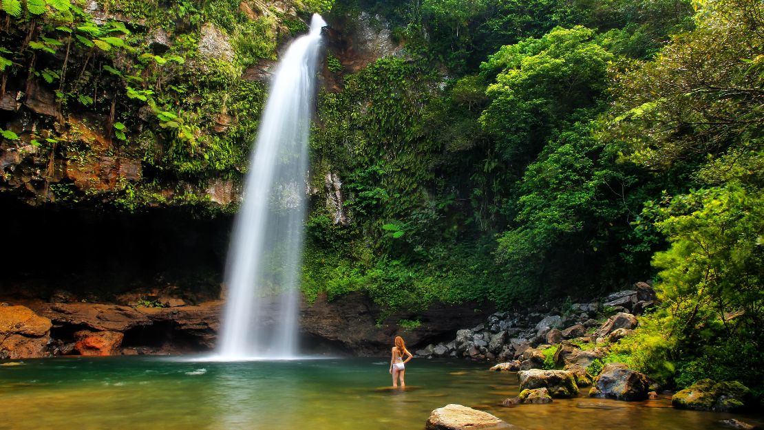 MY-FIJI-Woman-watching-a-waterfall-in-fiji