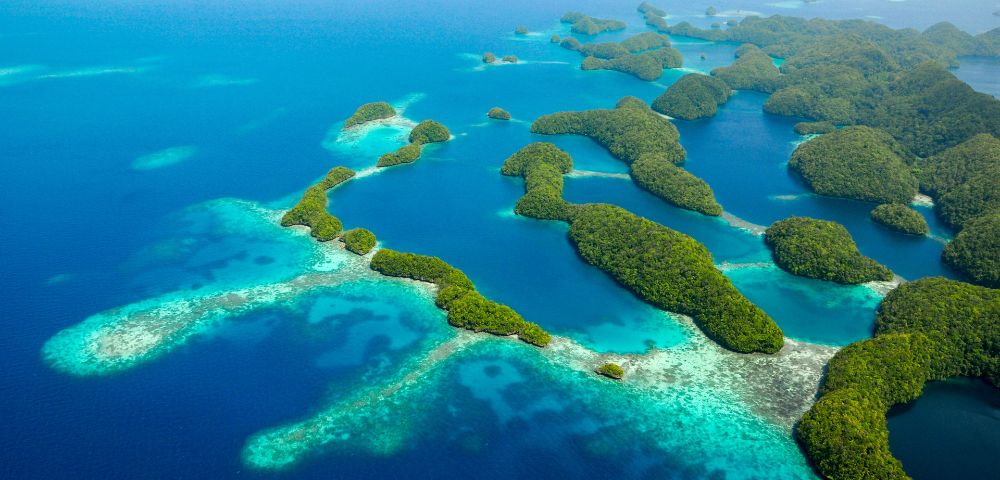 MY-HOLIDAY-Aerial-view-of-set-of-islands-crystal-clear-sea-and-reef