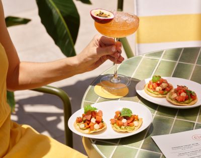 Crystalbrook Riley Calypso Club tuna tartar and cocktail on a green tile table by my queensland