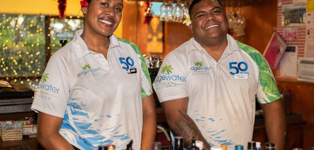 Two bartenders wearing 