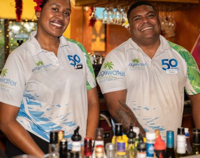 Two bartenders wearing 