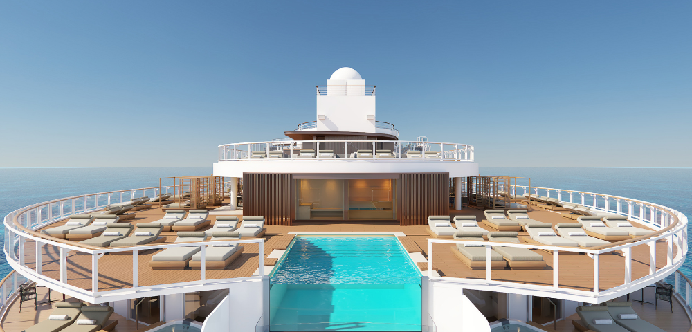 Luxury cruise ship deck featuring a serene pool, cozy lounge chairs, and expansive ocean views under a clear blue sky.