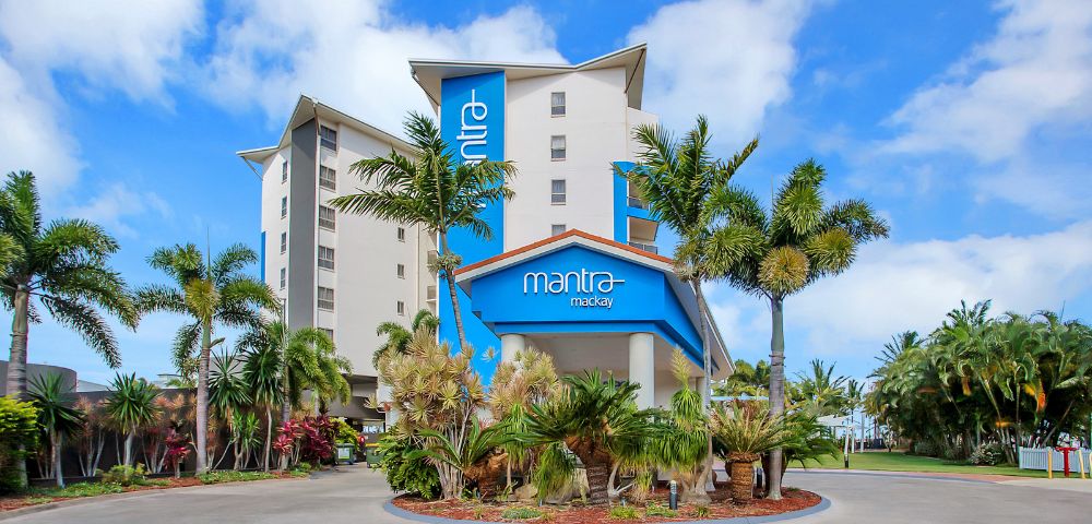 Hotel Exterior – The front view of a hotel named 