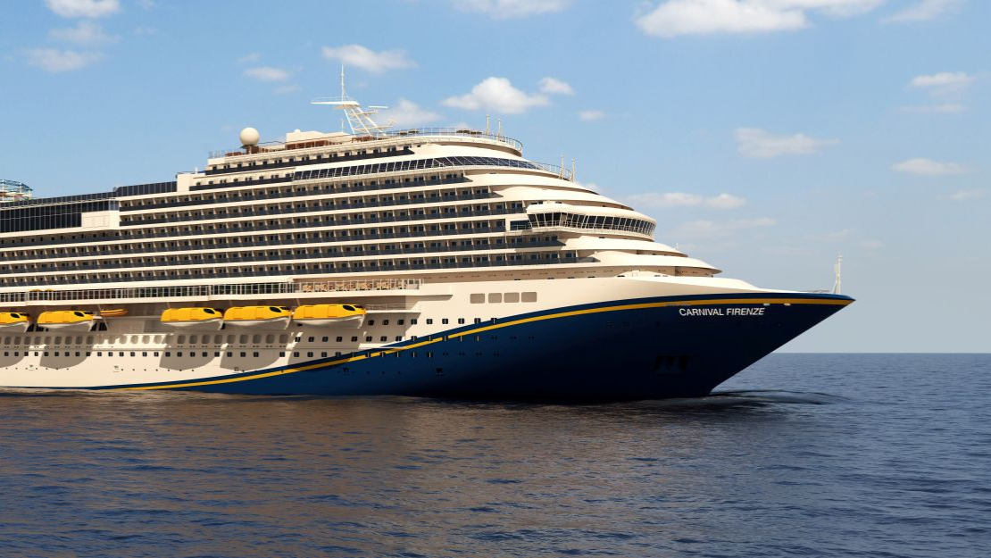 A large cruise ship, Carnival Firenze, sails on calm waters under a blue sky, showcasing its elegant design and yellow lifeboats.