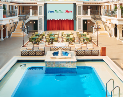 Elegant indoor space featuring an inviting pool, seating area, and a large screen displaying 
