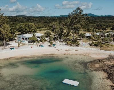 Cliffside view overlooking the ocean with dramatic terrain.