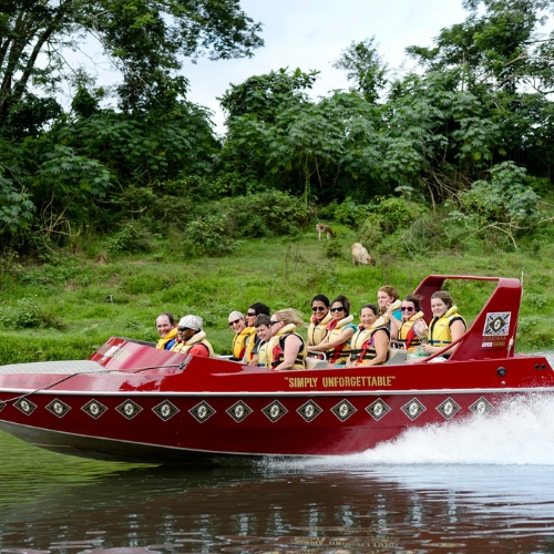 A red speedboat labeled 