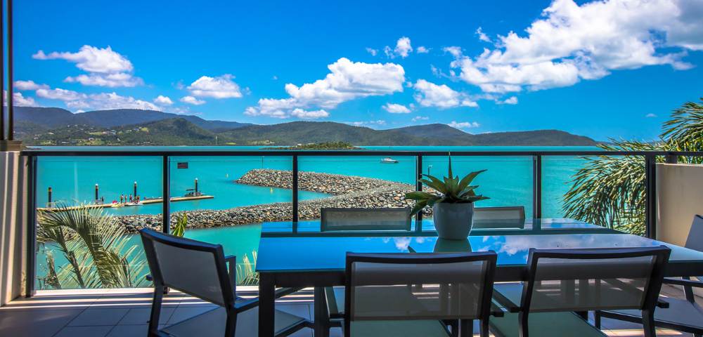 Another inviting pool area surrounded by greenery and tropical landscaping.
