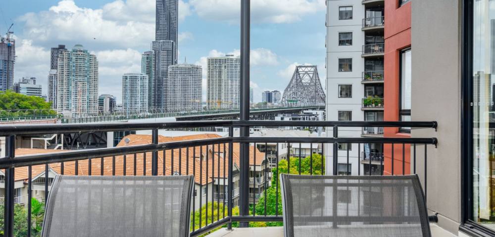 Bright and spacious 1-bedroom apartment featuring large windows and minimalist decor.