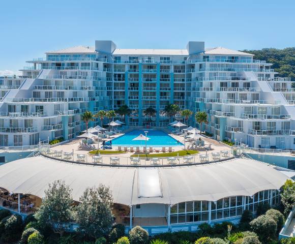 Elevated exterior view of Mantra Ettalong Beach resort showing its architecture and surroundings