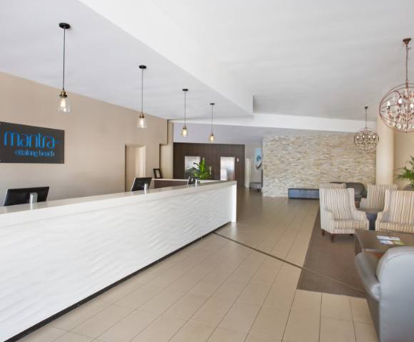 Lobby of Mantra Ettalong Beach with welcoming design and guest seating