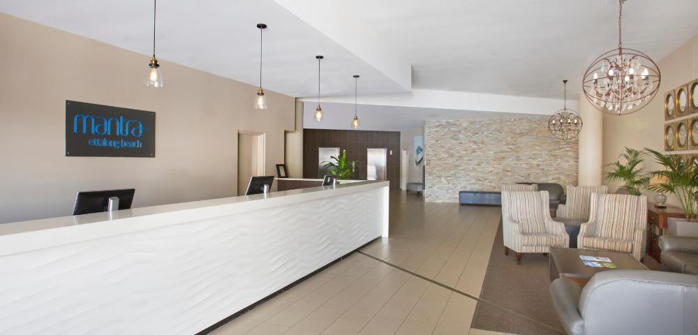 Lobby of Mantra Ettalong Beach with welcoming design and guest seating