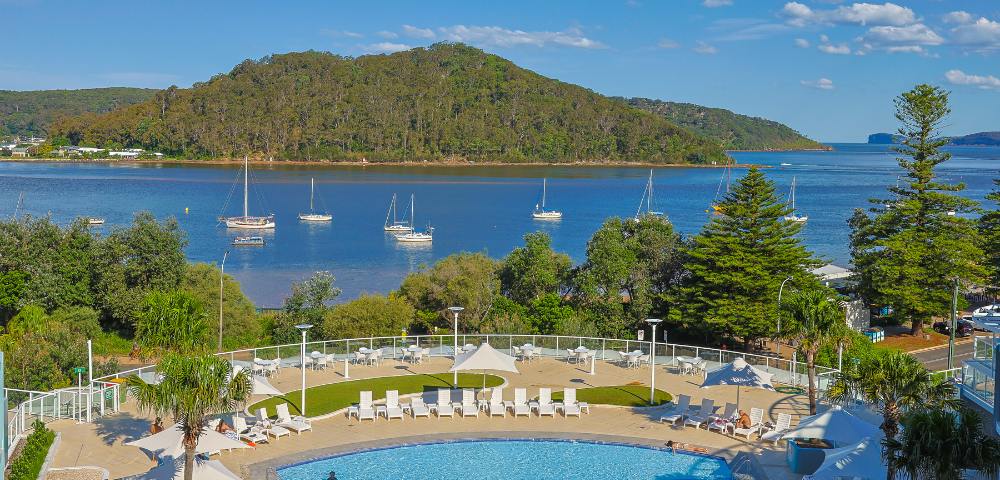 Panoramic view of the beach and ocean from Mantra Ettalong Beach resort