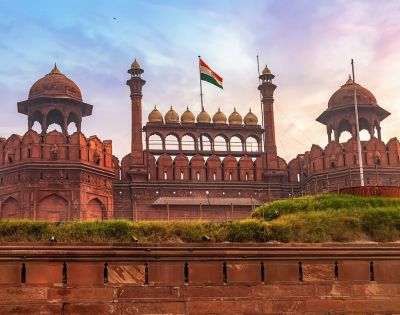 The historic Red Fort in Delhi with the Indian national flag flying above its main gate.