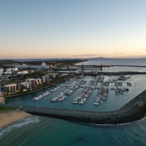 Aerial view of a marina with numerous boats.