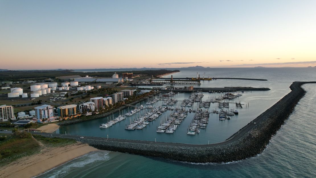Aerial view of a marina with numerous boats.