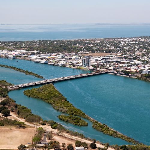 Aerial view of coastline and urban area.