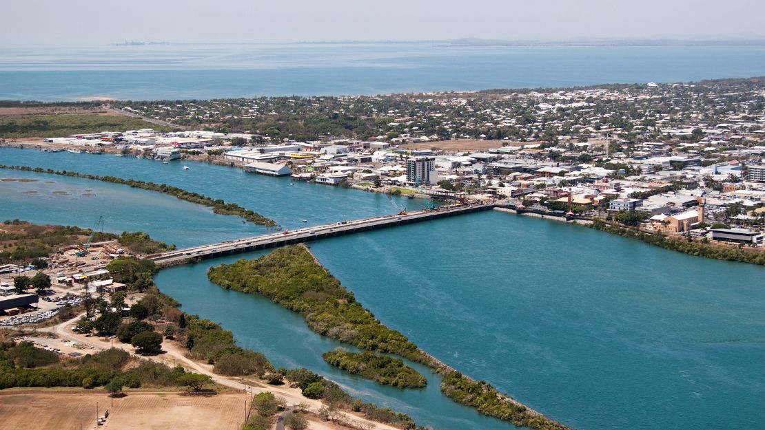 Aerial view of coastline and urban area.