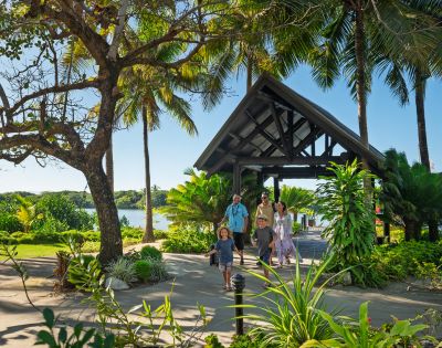 Palm trees and ocean view from a beachfront area at DoubleTree Resort by Hilton Hotel Fiji.