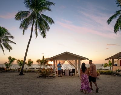 Exterior view of a modern beachfront cabana surrounded by tropical landscaping at DoubleTree Resort by Hilton Hotel Fiji.