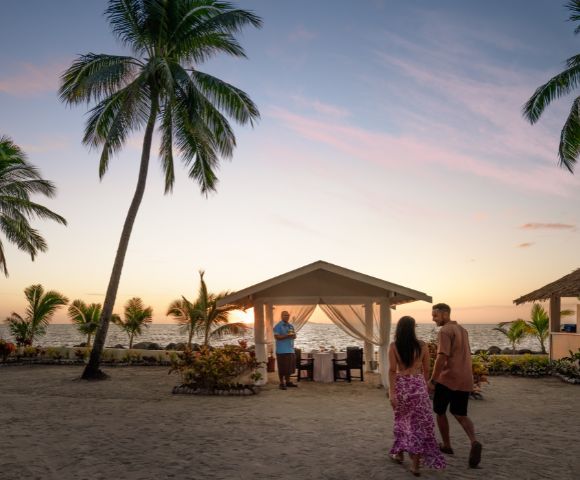 Exterior view of a modern beachfront cabana surrounded by tropical landscaping at DoubleTree Resort by Hilton Hotel Fiji.