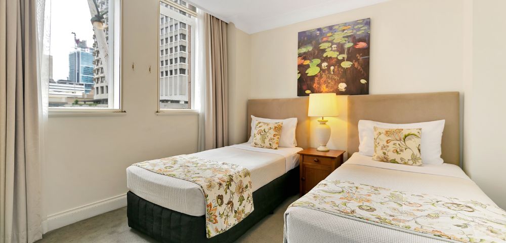 Two Bedroom Apartment with One Queen and Two Twin Beds Image