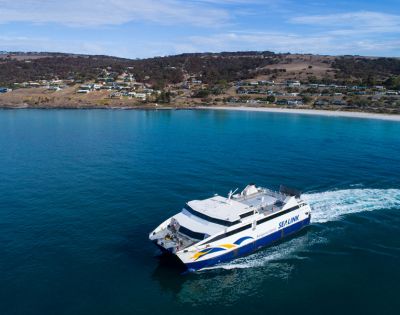 A white and blue ferry with 