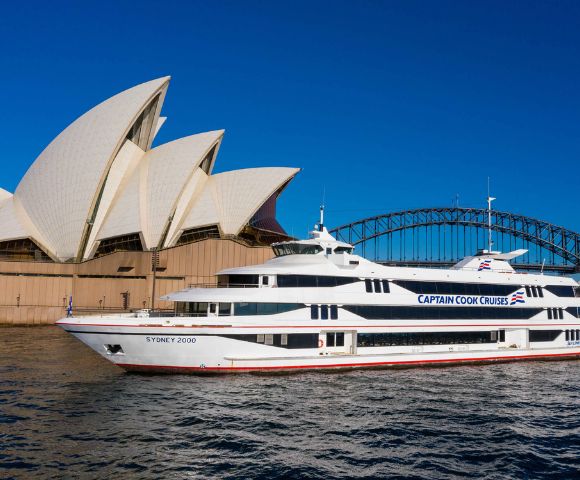 A white cruise ship labeled 