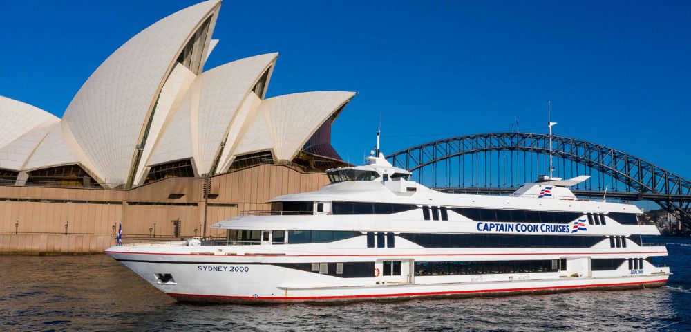 A white cruise ship labeled 