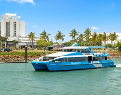 A blue and white ferry labeled 