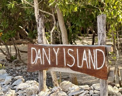 A wooden sign reading 