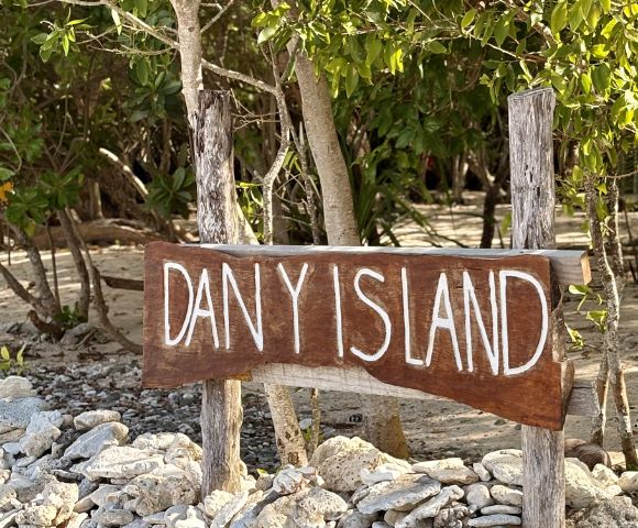 A wooden sign reading 