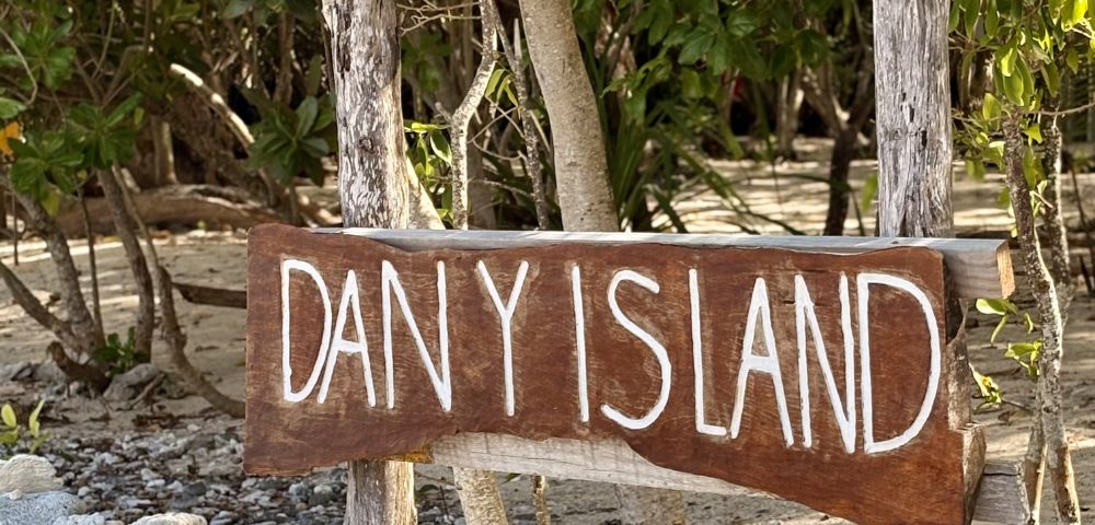 A wooden sign reading 