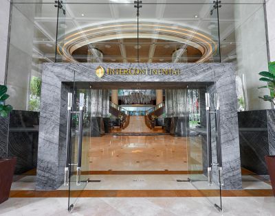 Glass entrance of a luxury hotel with 