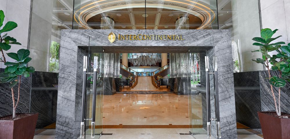 Glass entrance of a luxury hotel with 