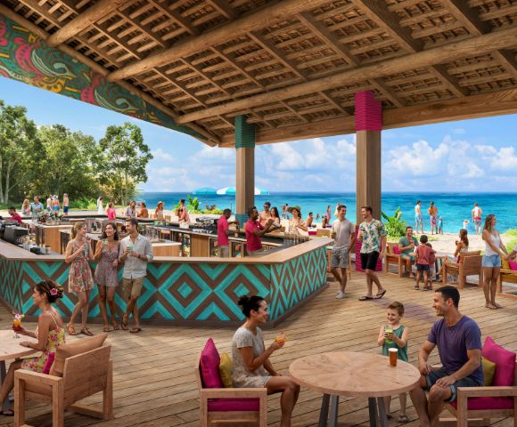 A vibrant beachside bar with people enjoying drinks under a colorful, open wooden roof. Clear blue sky and ocean in the background convey a relaxed, tropical mood.