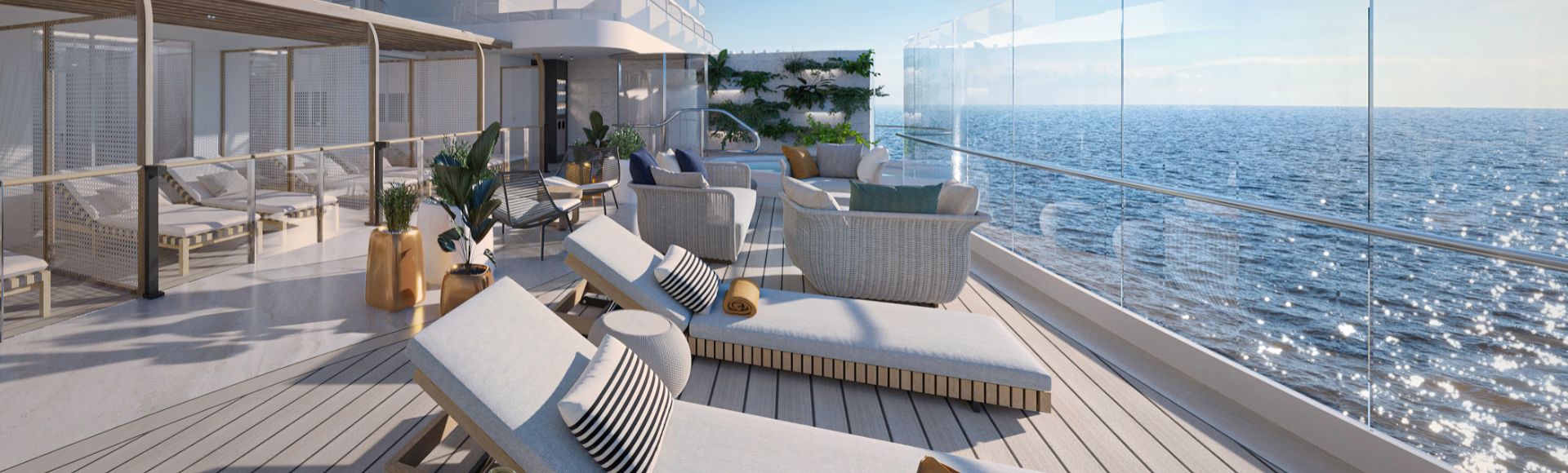 Spacious cruise ship deck with lounge chairs, plants, and a glass railing, overlooking the sparkling ocean. The scene conveys relaxation and luxury.